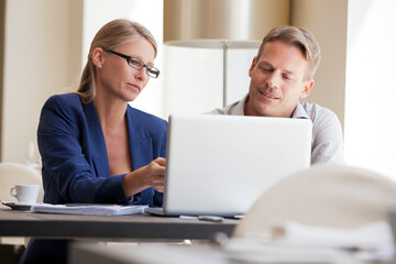 Business people working on laptop