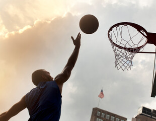 Man playing basketball on court