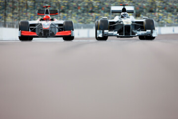 Race cars driving on track