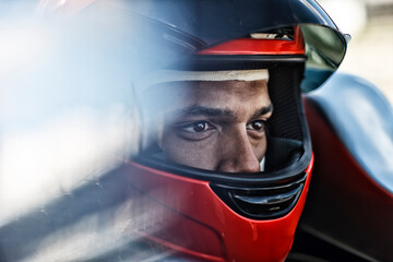 Racer sitting in car