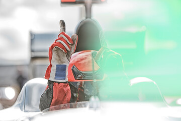 Racer gesturing in car