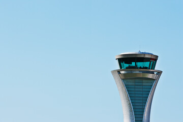 Air traffic control tower and blue sky