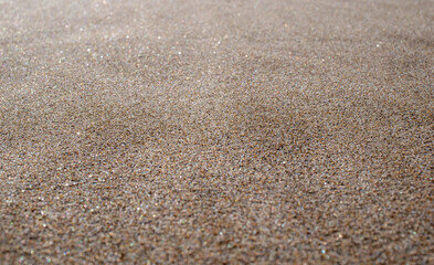 Fototapeta na wymiar Sand texture and background.Sand on the beach in the background.Sandy beach for black background.Sand of a beach in summer.Copy space.Summer concept
