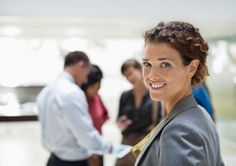 Businesswoman smiling in office