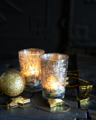 Christmas ornament with tinsel and candles