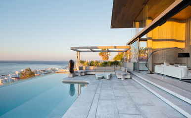 Infinity pool and patio of modern house