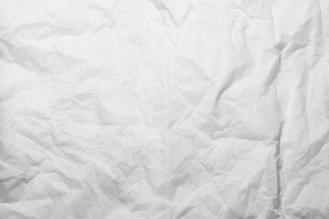 Obraz premium Single creased crumpled white napkin with shadows. Abstract Background