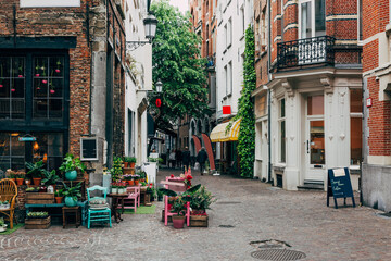 Old street with flower shop in historic city center of Antwerpen (Antwerp), Belgium. Cozy cityscape...