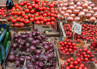 Tomatoes, onions, cucumbers, at the street market
