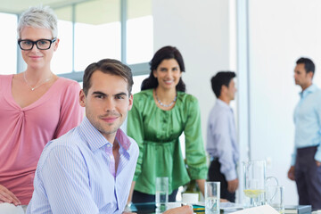 Business people smiling in office