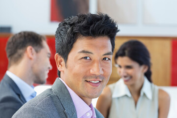 Businessman smiling in office