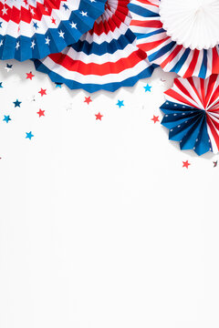 4th of July American Independence Day. Happy Independence Day. Red, blue and white star confetti, paper decorations on white background. Flat lay, top view, copy space
