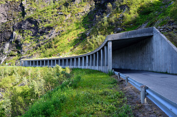 Fototapeta premium semi tunnel in mountain side on senja island for falling rock protection