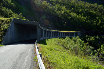 Fototapeta premium semi tunnel in mountain side on senja island for falling rock protection