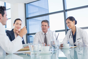 Doctors talking in meeting