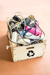 box with e-waste from household electrical appliances
