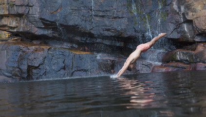 Man diving into lake