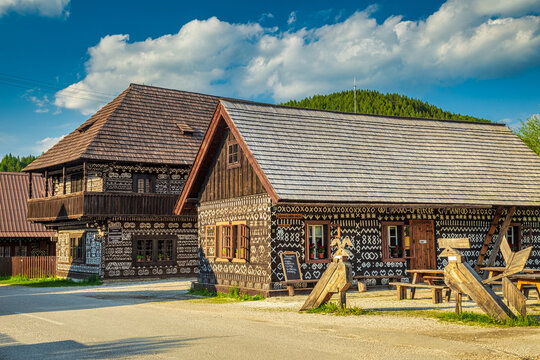 CICMANY, SLOVAKIA - MAY 25, 2019: Folk architecture of Cicmany village in Zilina Region. Characteristic patterns on the facades of wooden houses.
