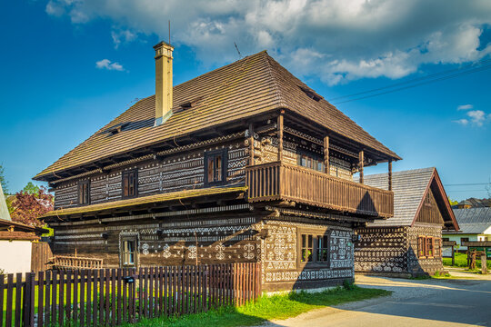 CICMANY, SLOVAKIA - MAY 25, 2019: Folk architecture of Cicmany village in Zilina Region. Characteristic patterns on the facades of wooden houses.