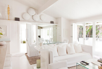 Fototapeta na wymiar Dining table and living room in modern home