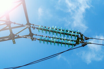 High-voltage insulated wires on glass insulators of power transmission towers