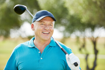Senior man holding golf club