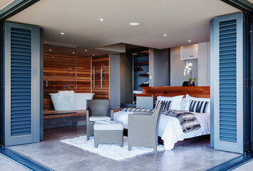 Obraz premium Patio doors open to modern bedroom