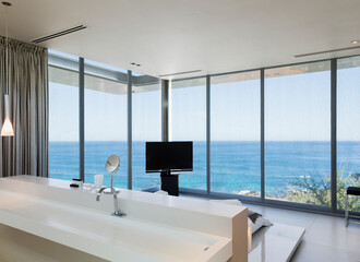 Fototapeta na wymiar Modern bedroom with ocean view