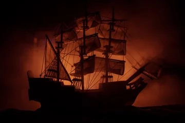 Gordijnen Zwart silhouet van het piratenschip in de nacht © zef art