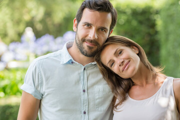 Couple hugging outdoors