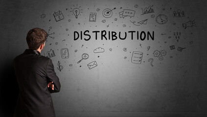 businessman drawing a creative idea sketch with DISTRIBUTION inscription, business strategy concept