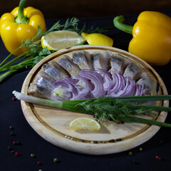 herring with red onion in oil
