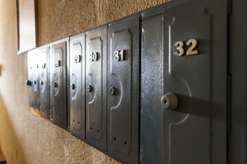 Mailboxes in the entrance of an apartment building.