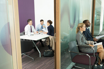 Business people talking in meeting