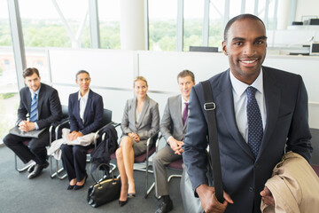 Businessman smiling in office