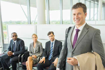 Businessman smiling in office