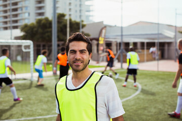 Soccer player smiling on field