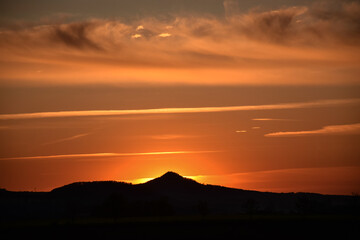 Sunset with most famous Polish old volcano, Ostrzyca