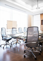 Chairs and table in empty conference room