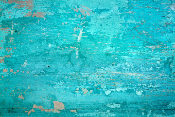 Old crackled painted wood surface. Vintage wooden wall or floor with cracked paint.