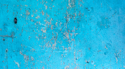 Fototapeta na wymiar Old teal crackled painted wood surface. Vintage wooden wall or floor with cracked paint.