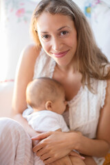 Fototapeta na wymiar Mother holding baby boy