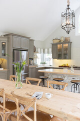 Wooden dining table in luxury kitchen