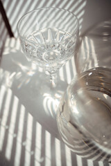 White flowers in a glass on a windowsill
