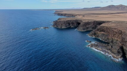 look at the sea from the cliffs next to the mountains