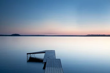 Fototapete Dock over still lake, Saratoga Lake, New York, United States © David Henderson/KOTO