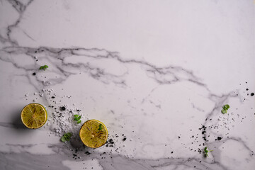 Fresh Bergamot fruits cut in half with leaves isolated on white background
