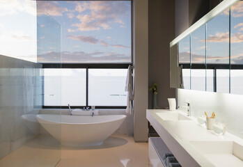 Soaking tub in modern bathroom