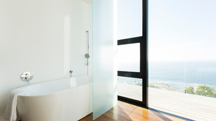 Bathtub and sliding glass door of modern house
