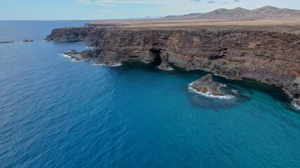 look at the sea from the cliffs next to the mountains
